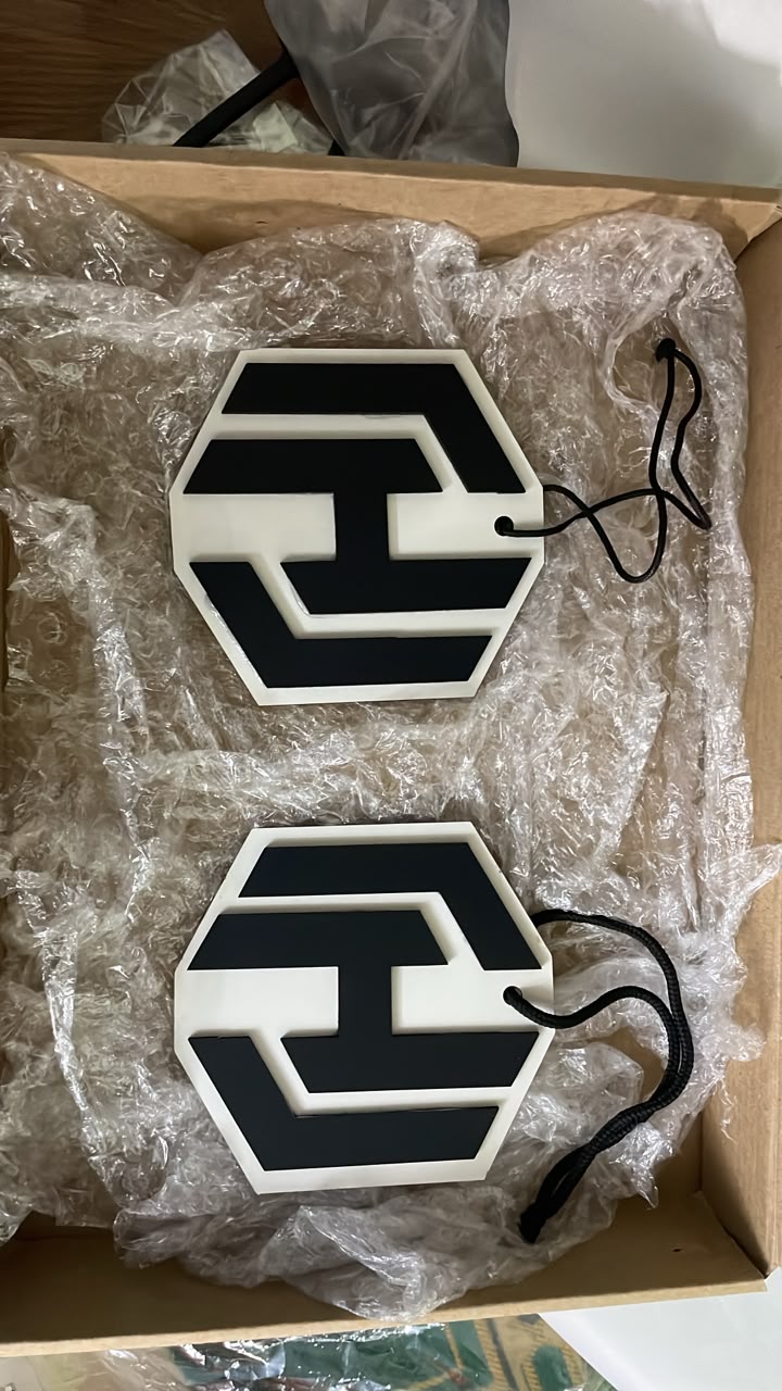 Custom car hangers cut to a personal logo, made as a matching pair on both sides or different designs, your preference.
